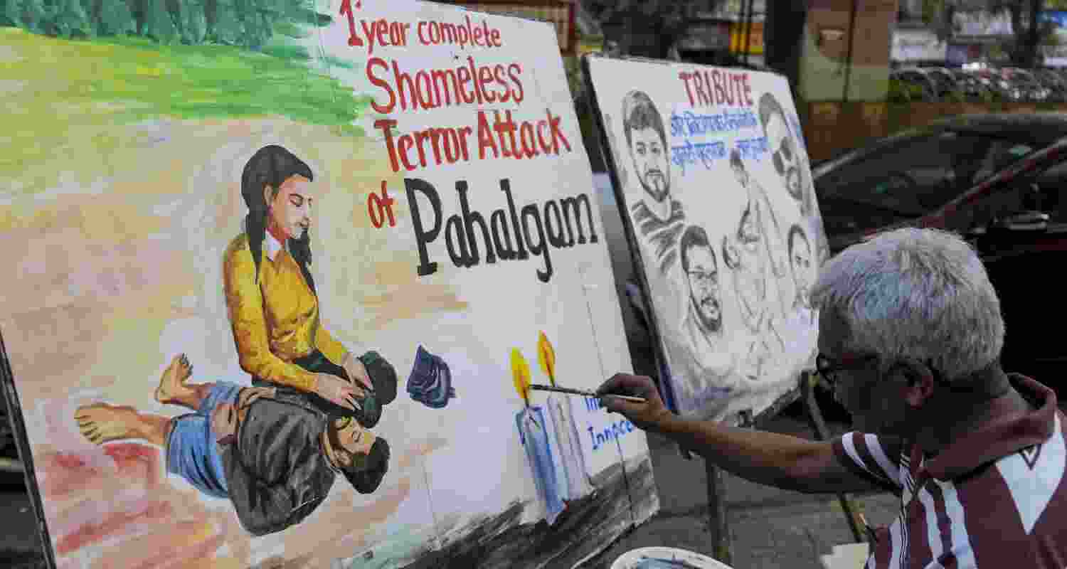  An artist paints a tribute to the civilians killed in the Pahalgam attack ahead of its first anniversary, in Mumbai, Tuesday, April 21, 2026.