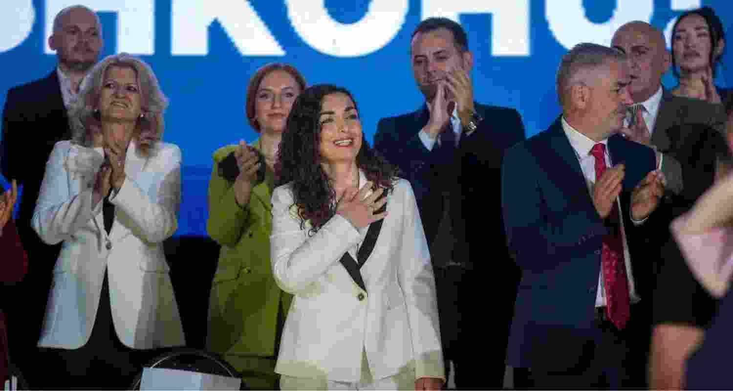 Former Kosovo president Vjosa Osmani greets supporters at the closing political rally of the Democratic League of Kosovo in Pristina on Friday.
