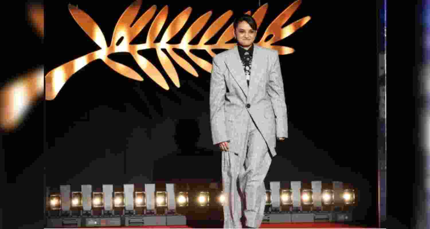 Cannes 2025 opening ceremony: Payal Kapadia stunned on the red carpet in a plaid grey powersuit. She added an Indian touch to her outfit by complementing her attire with traditional silver jewellery.