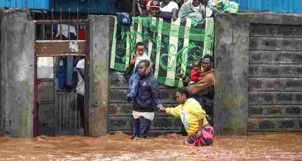A family moving to a safer place following heavy rains in Nairobi, Kenya.