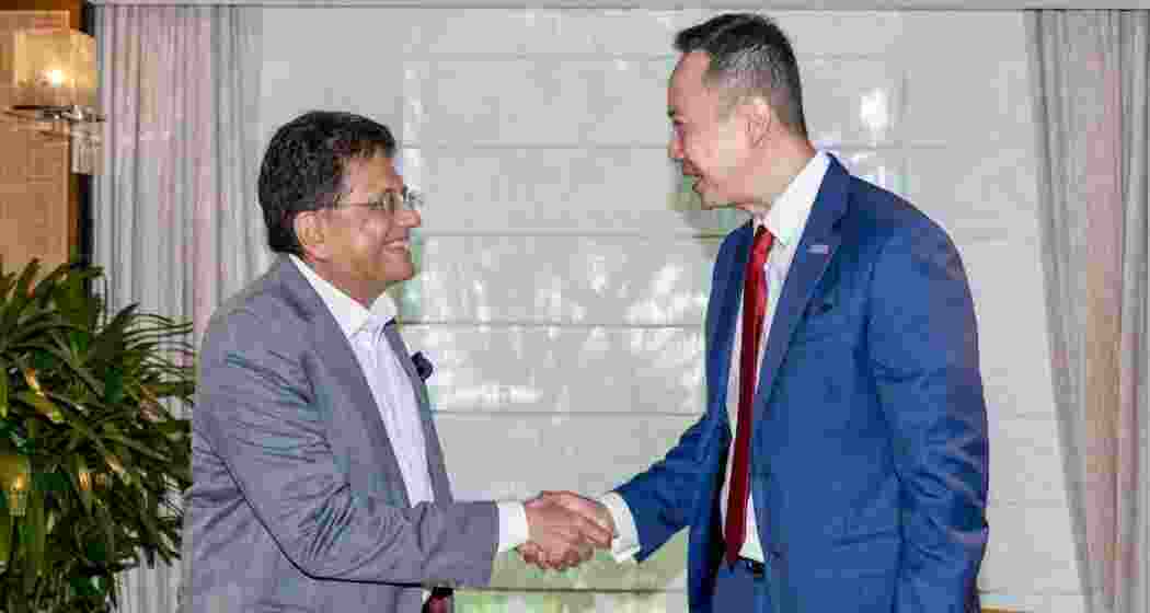 Commerce Minister Piyush Goyal with Singapore Business Federation Chairman Mark Lee in Singapore on Friday.