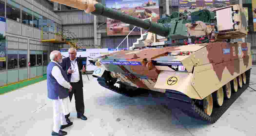 Prime Minister Narendra Modi reviews defence and engineering projects at L&T’s Hazira complex in Surat on Friday.