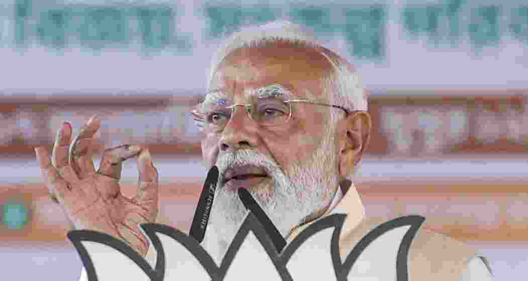 Prime Minister Narendra Modi addresses during a public meeting ahead of the Assembly elections, in Malda district, West Bengal on Saturday.