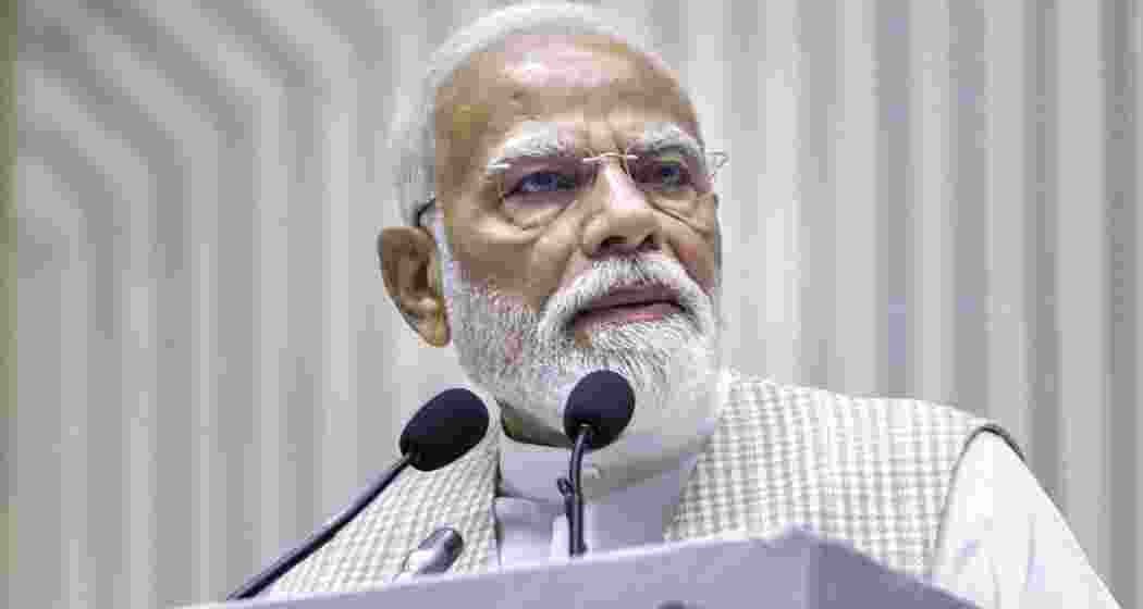Prime Minister Narendra Modi addresses the gathering during the 'Nari Shakti Vandan Sammelan', in New Delhi. 