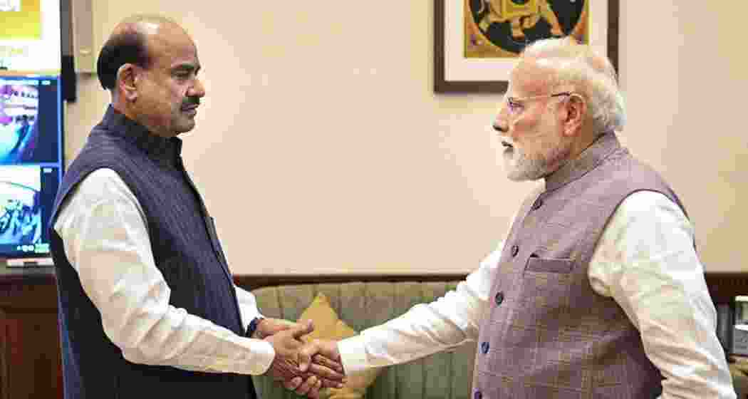 Prime Minister Narendra Modi meets Lok Sabha Speaker Om Birla after the House was adjourned sine die, concluding the Budget session of Parliament, in New Delhi. (@sansad_tv/X via PTI Photo).