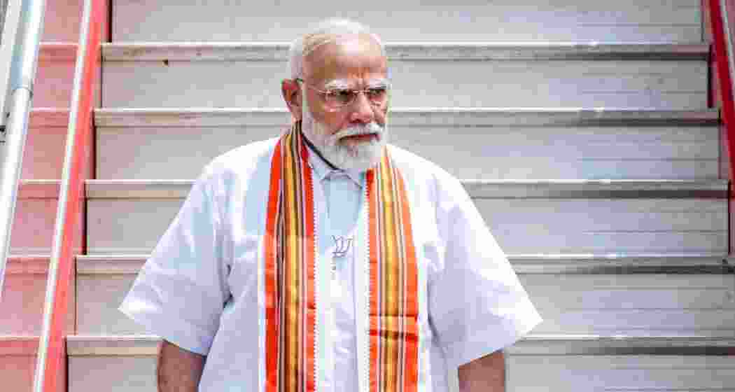 Prime Minister Narendra Modi wears 'Mundu', a traditional garment from Kerala, upon his arrival, in Kerala. (PMO via PTI Photo)