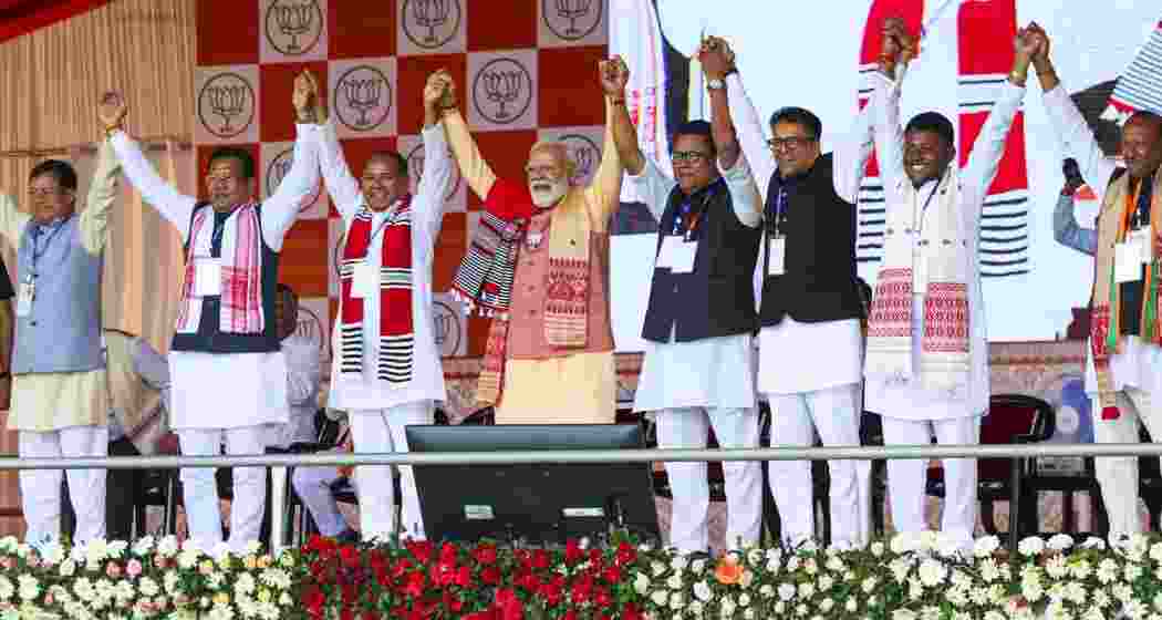 Prime Minister Narendra Modi, and others, during a public meeting, in Gogamukh, Assam on Wednesday. 