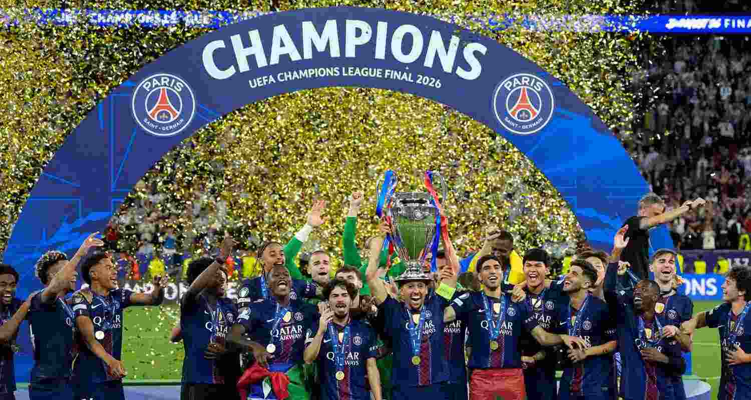 PSG's Marquinhos lifts the trophy celebrating after winning the Champions League final soccer match between Paris Saint-Germain and Arsenal in Budapest, Hungary, Saturday, May 30, 2026.