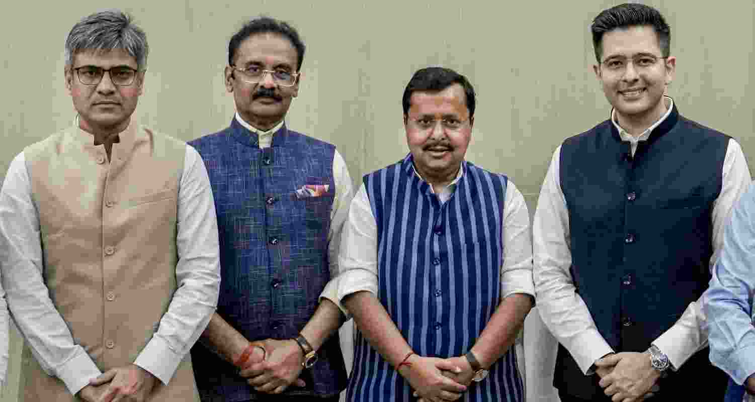 BJP National President Nitin Nabin (second from right) meets Rajya Sabha MPs Raghav Chadha (extreme right), Sandeep Pathak (extreme left) and Ashok Mittal (second from left) at the party's headquarters, in New Delhi, Friday. 