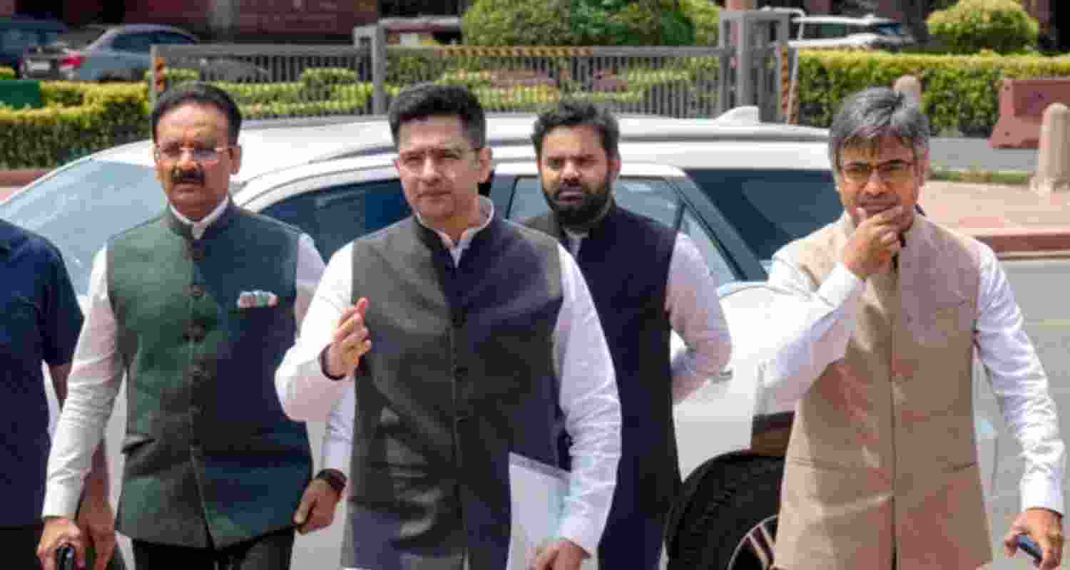 Rajya Sabha MPs Raghav Chadha (front), Sandeep Pathak (right) and Ashok Mittal leave after meeting President Droupadi Murmu in New Delhi on Tuesday.