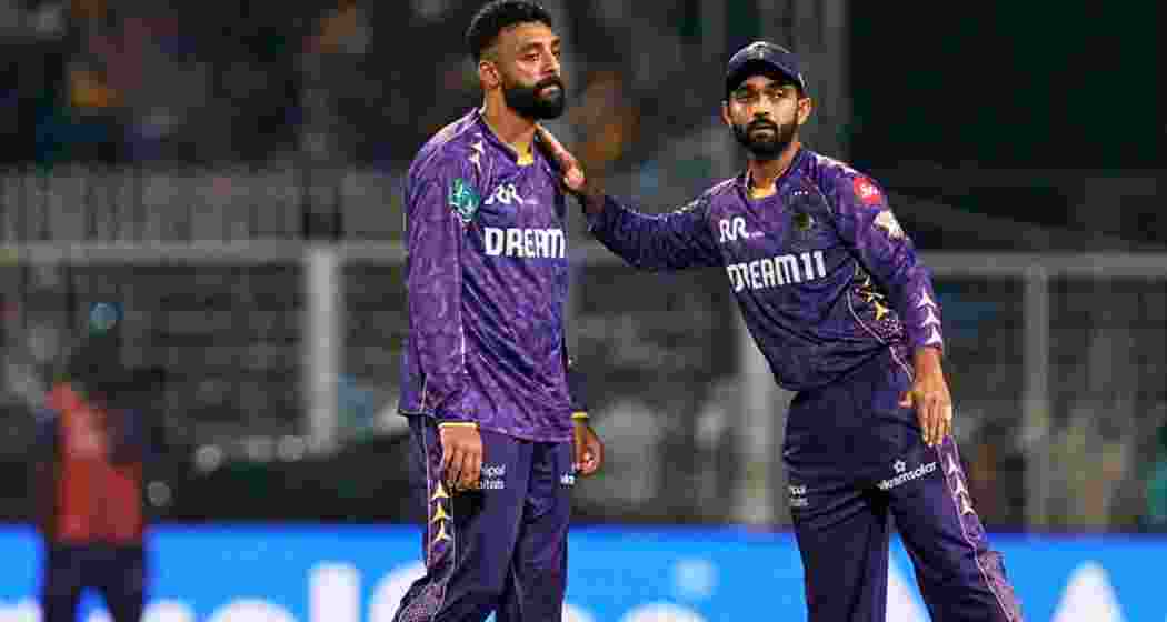KKR skipper Ajinkya Rahane with spinner Varun Chakravarthy during the IPL 2025 clash against RCB at Eden Gardens, Kolkata, on Saturday. 