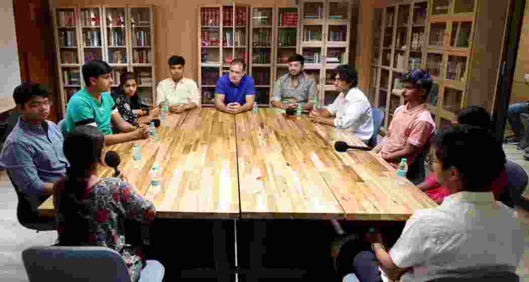 Leader of Opposition Rahul Gandhi interacts with Vedant Shrivastava, his brother Siddhant and other students linked to the CBSE OSM controversy during a meeting in New Delhi on Sunday.