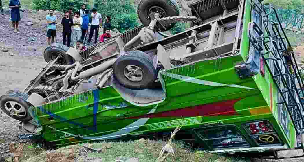 Rescue efforts underway after a minibus overturned in Ghambir Mughlan, Rajouri on Tuesday. The mishap left ten injured and followed a separate fatal crash in Banihal involving a nomadic family.