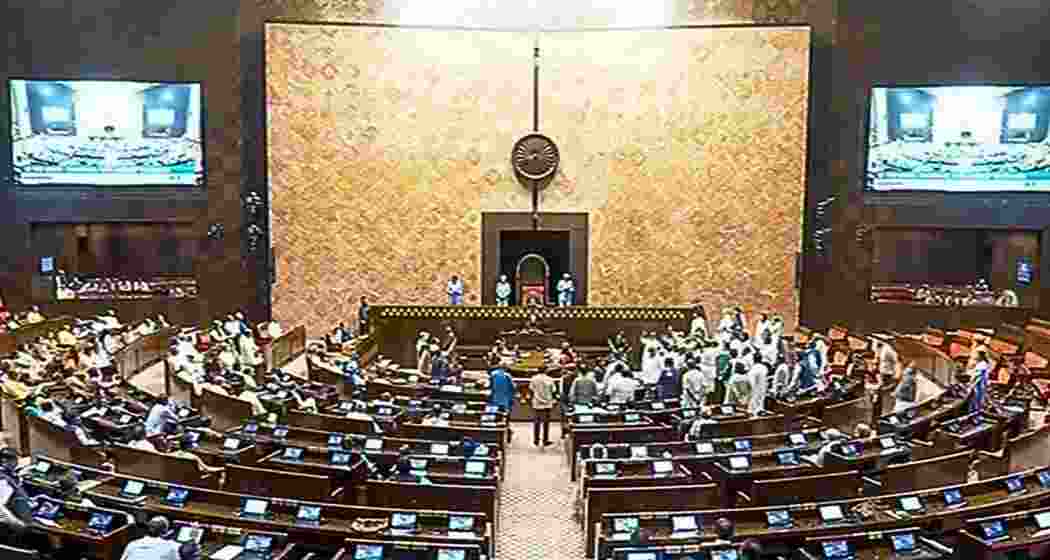 Opposition MPs walk out of the Rajya Sabha.