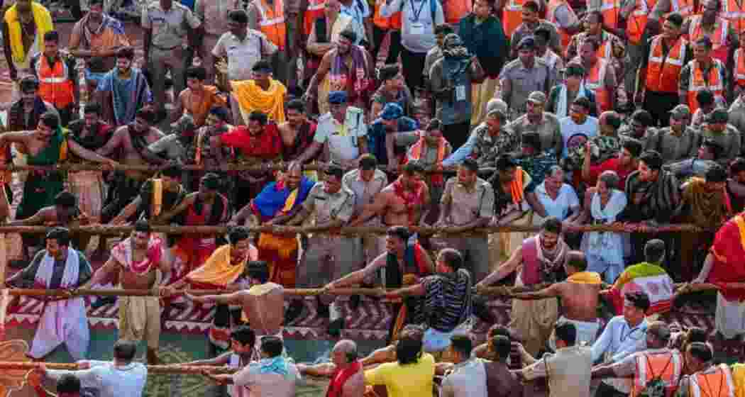 Devotees pull the chariot of Lord Jagannath on Puri’s Grand Road on Saturday.
