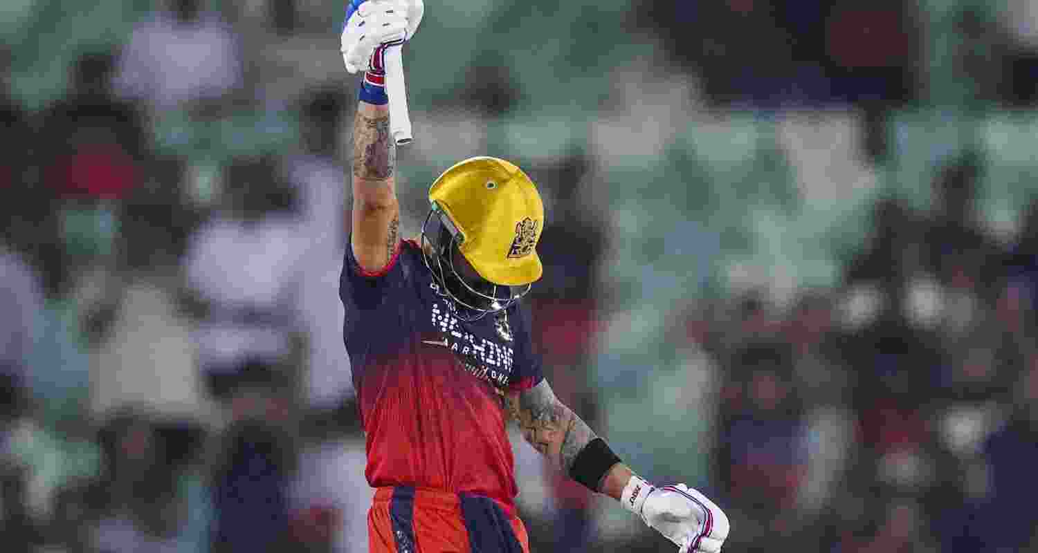 Royal Challengers Bengaluru's Virat Kohli celebrates his half century during an Indian Premier League (IPL) 2026 T20 cricket match between Royal Challengers Bengaluru and Kolkata Knight Riders. 