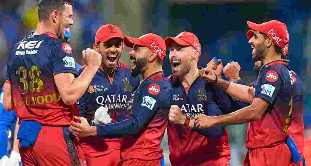 RCB players celebrate after sealing a thrilling 12-run win over Mumbai Indians at Wankhede, ending their long-standing losing streak at the venue with a dominant all-round performance.