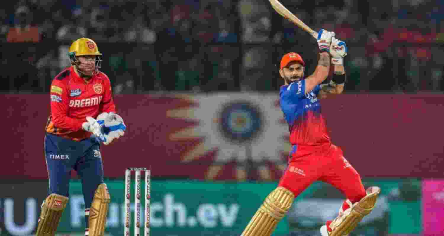 Royal Challengers Bengaluru's Virat Kohli plays a shot against PBKS. 