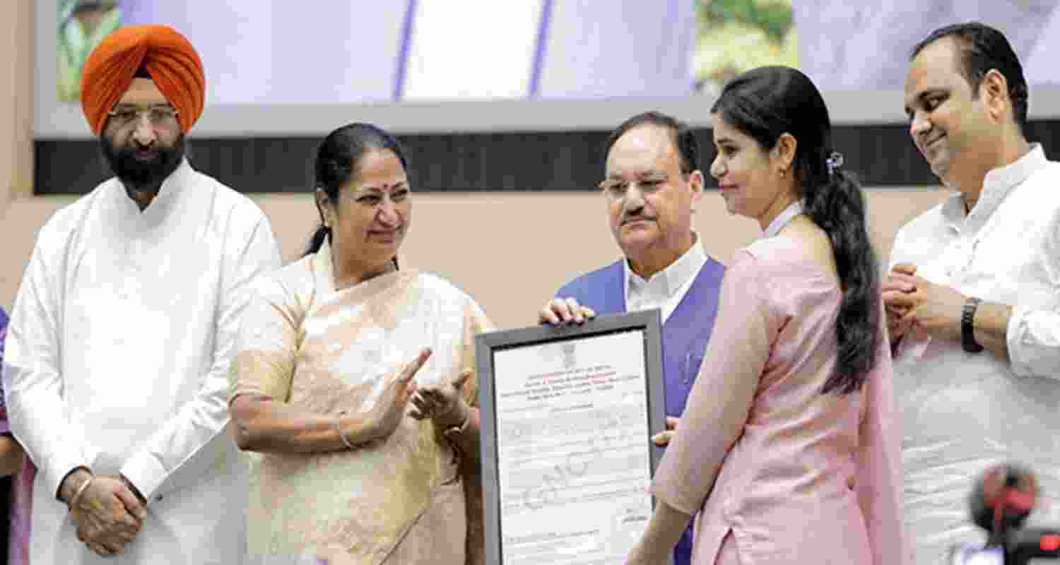 Union Health Minister J.P. Nadda with Delhi Chief Minister Rekha Gupta and Delhi Health Minister Pankaj Kumar Singh during a ceremony for distribution of appointment letters to nurses and paramedical staff, and flagging off of the Ayushman Bharat registration vans, in New Delhi, Sunday.