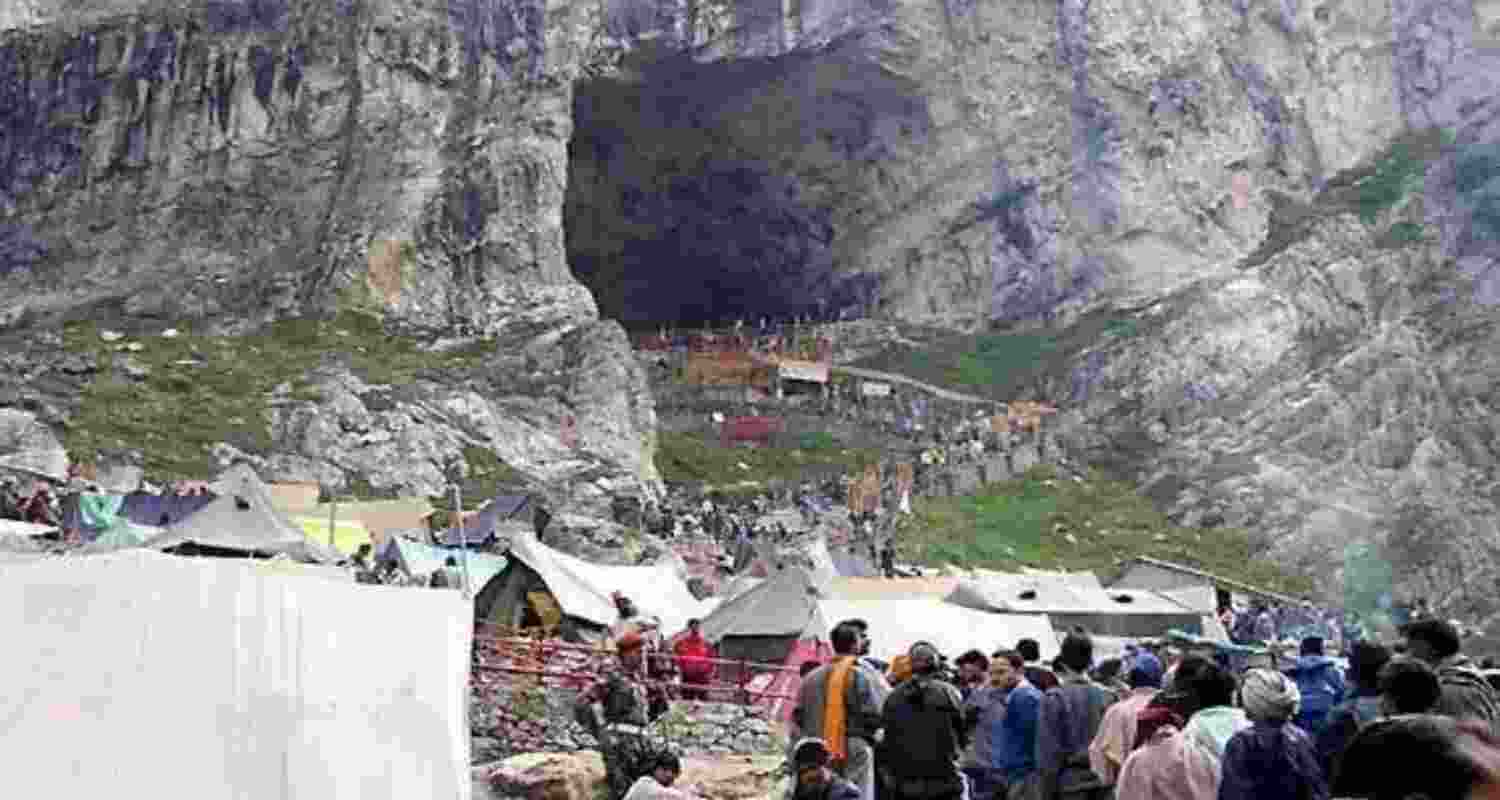 Devotees make their way to the Amarnath cave shrine as the annual Yatra witnesses a surge in pilgrim footfall this year. 