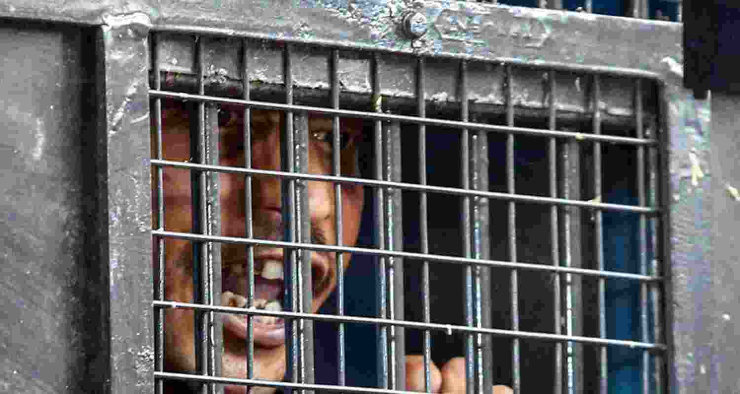 A file photo of RG Kar hospital rape-murder case convict Sanjay Roy being taken to jail from court in Kolkata. 