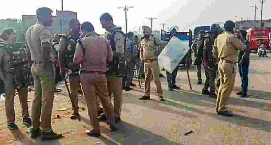 Security personnel at the site of the highway blockade following protests over the BJP's Datia Assembly bypoll candidate.