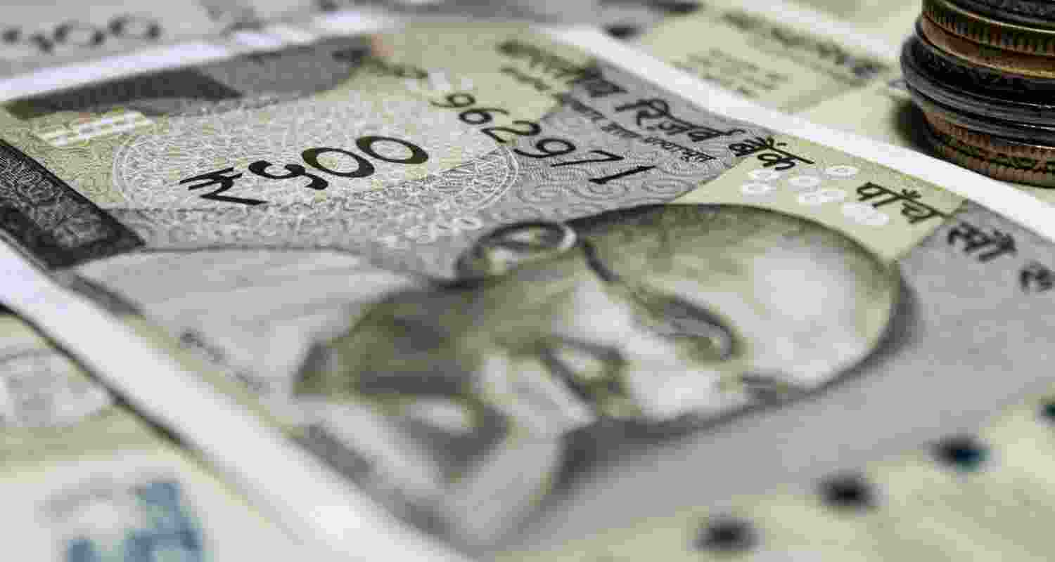 Rupee falls 18 paise to 93.94 vs US dollar amid foreign outflows; weaker crude, softer dollar and firm equities limit sharper losses.