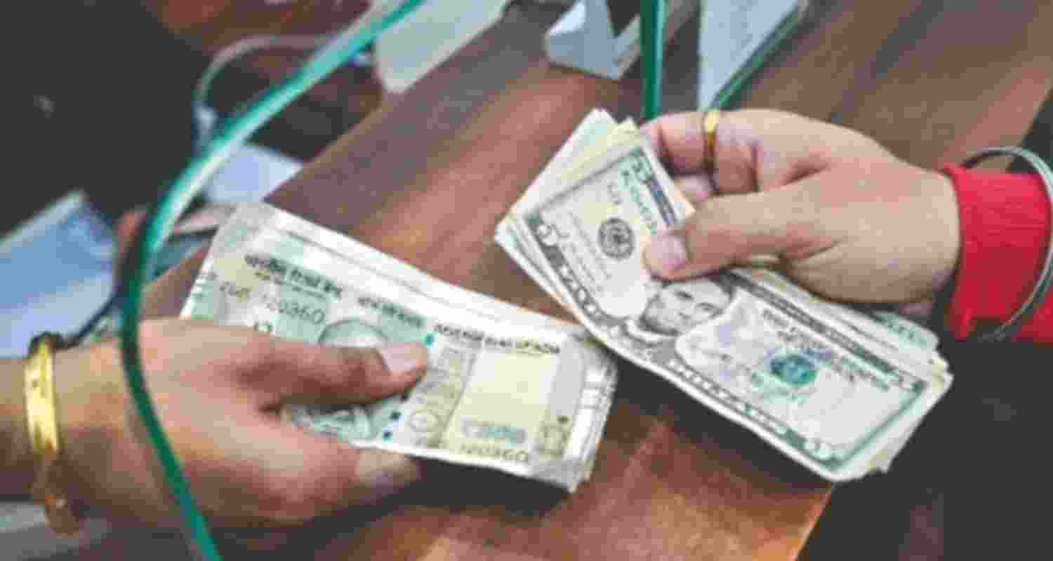 Rupee drops 20 paise against US dollar, gold falls below ₹1.5 Lakh