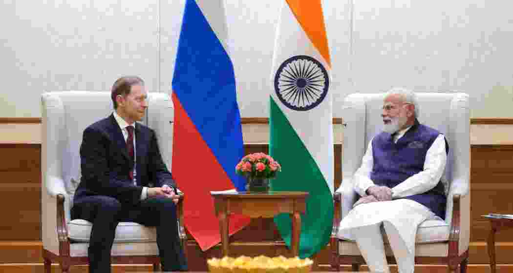 Prime Minister Narendra Modi (R) meets Russia’s Denis Manturov in New Delhi on Friday.