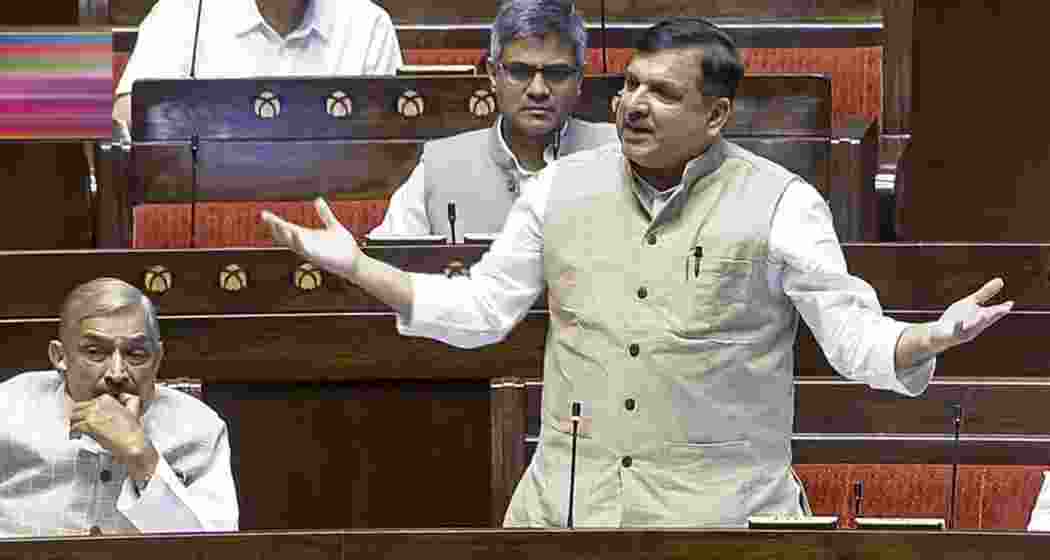 AAP MP Sanjay Singh speaks in the Rajya Sabha during the second part of the Budget session of Parliament, in New Delhi, on Monday. AAP MP Sandeep Pathak, back, and Congress MP Pramod Tiwari are also seen. 