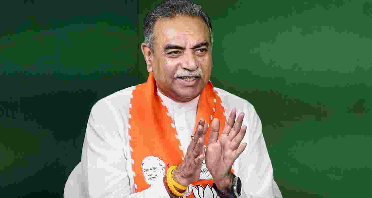 Union Minister Smriti Irani with BJP candidate from Chandigarh constituency Sanjay Tandon during a public meeting for Lok Sabha elections, in Chandigarh, Tuesday. 