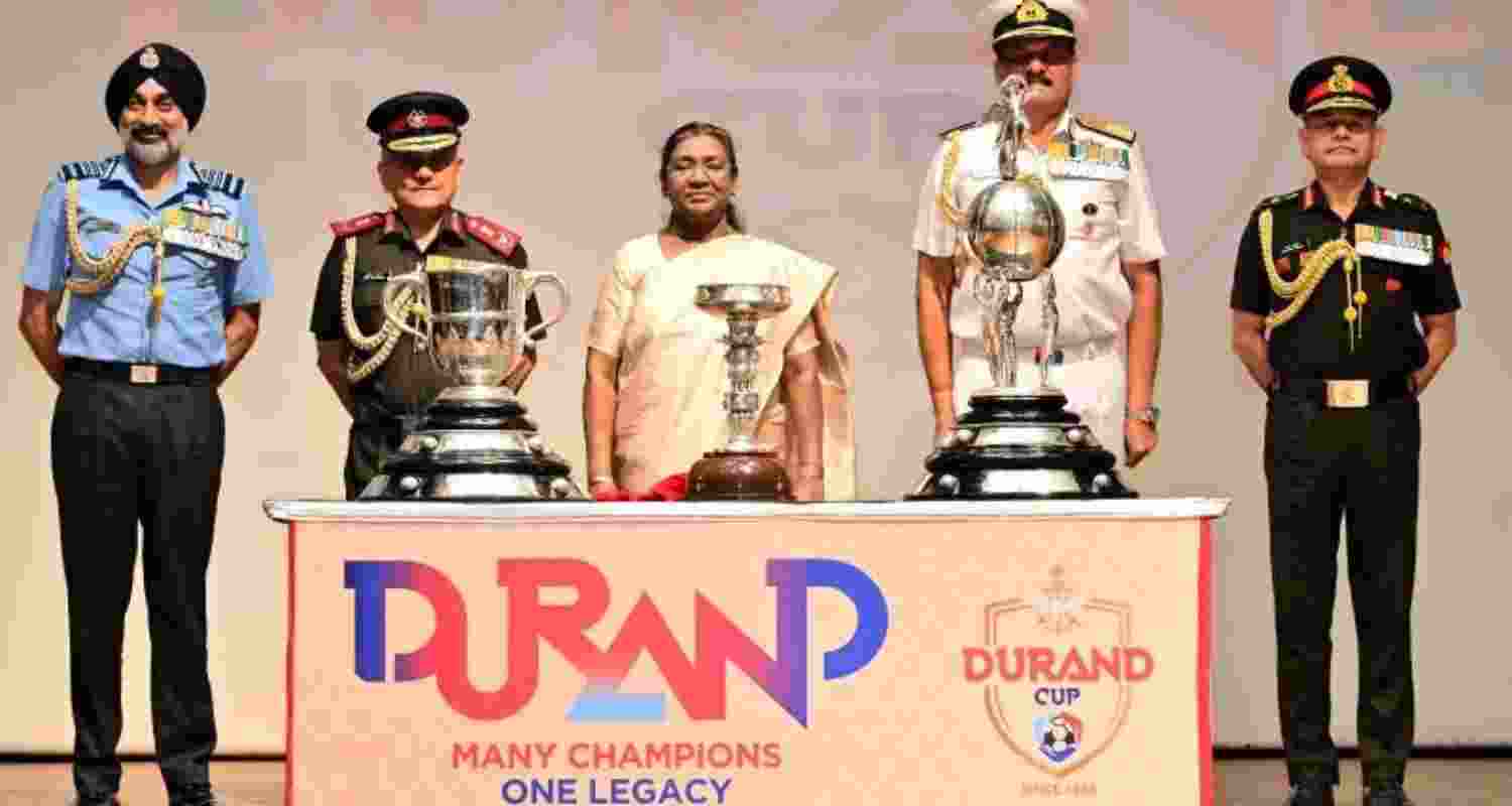 President Droupadi Murmu unveiling the trophies of the tournament at a function organised by the Army at the Rashtrapati Bhavan on Friday.