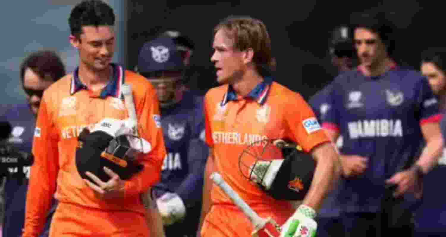Netherlands captain Scott Edwards (left) and Bas de Leede leaving the ground after scoring the winning runs.