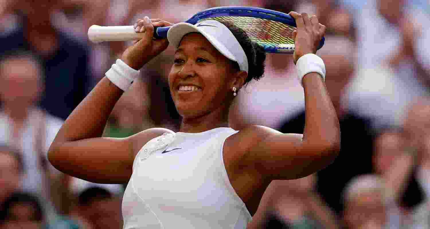 Naomi Osaka reacts after defeating top seed Aryna Sabalenka in straight sets.