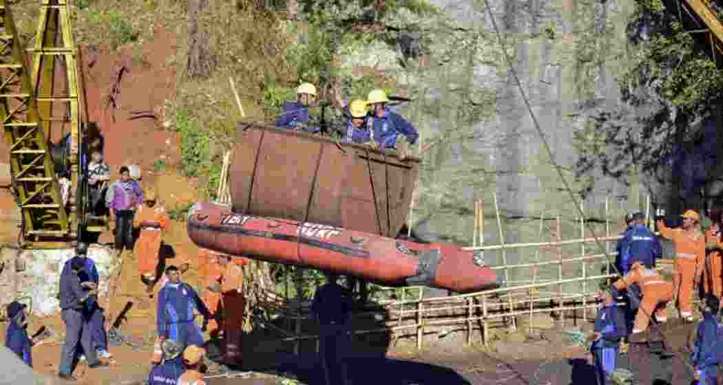 SDRF personnel carry out a rescue operation at Mooknor in Jalyiah village, around 5 km from the East Jaintia Hills district headquarters.