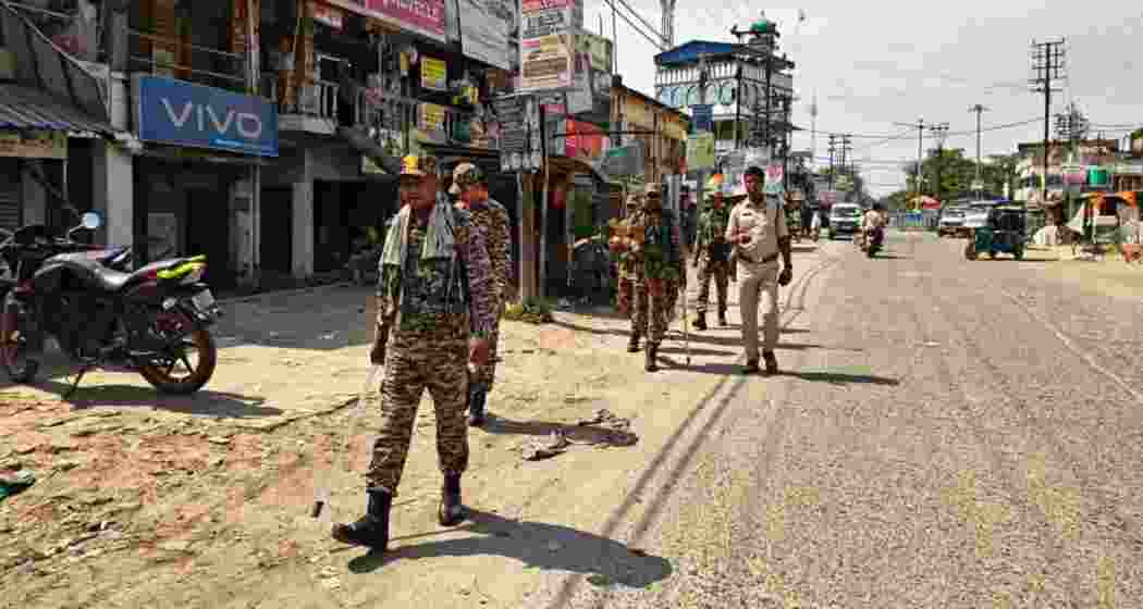 Police personnel patrol a street in Malda amid heightened security following unrest over the SIR electoral roll revision. (File photo)