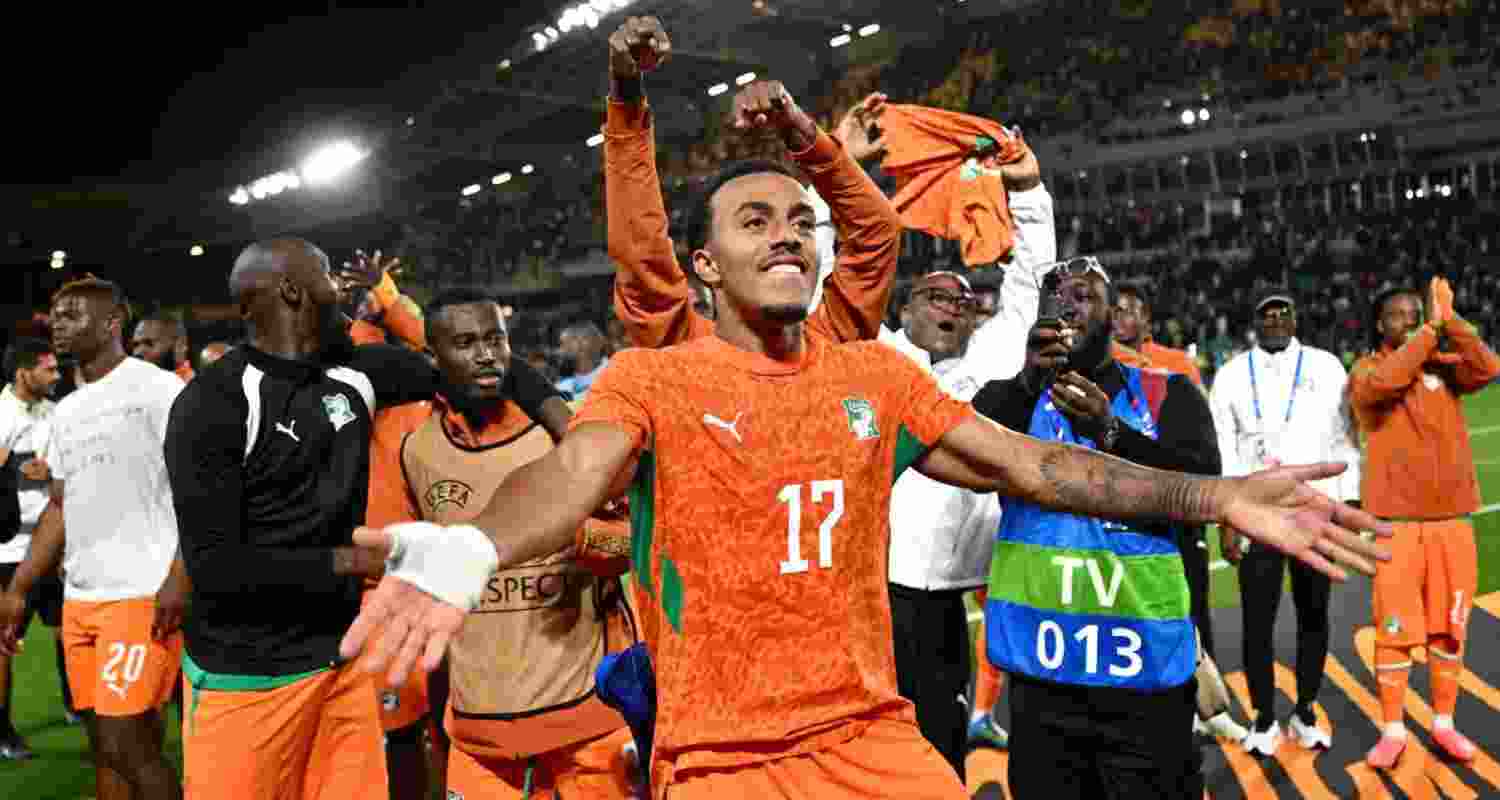 Ivory Coast players celebrating their 2-1 win over France.