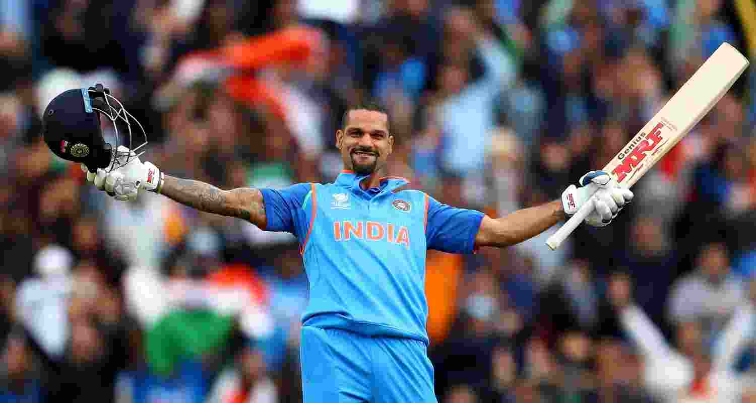 Dhawan celebrates a century. Image via X.
