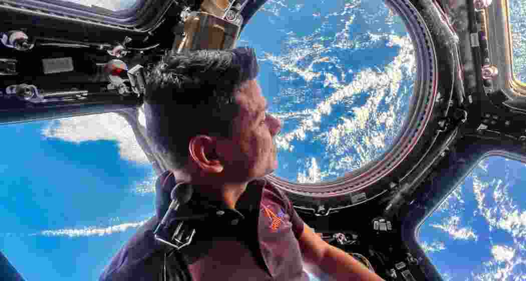 Indian astronaut Shubhanshu Shukla gazes at Earth from the International Space Station during the Axiom-4 mission.