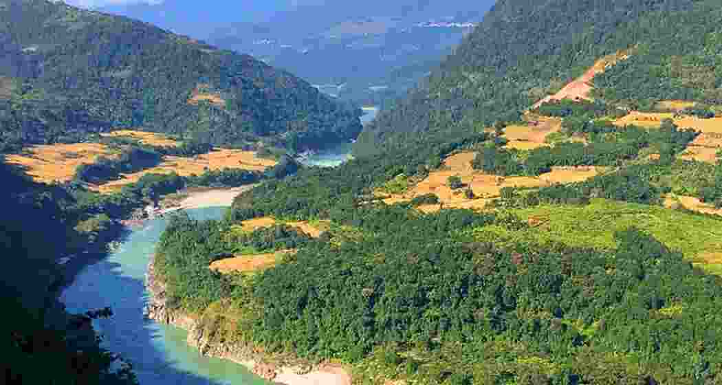 The Siang River flows past the proposed site of the dam project, where construction may begin if the plan is approved.
