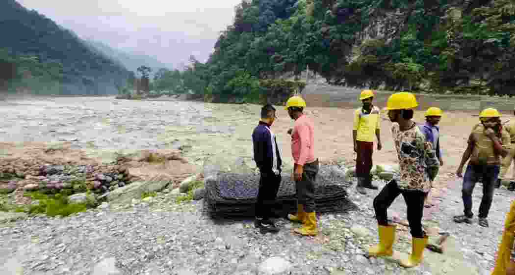 Rescue operations after nine people went missing after a vehicle fell into the Teesta River on 29th May, following landslides, in Mangan on Saturday. (Image: ANI)