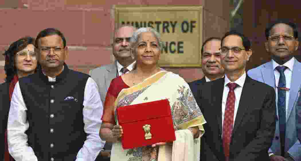 Union Minister for Finance and Corporate Affairs Nirmala Sitharaman along with the Ministers of State for Finance Pankaj Chaudhary and team members of Finance, outside the her office at North Block in New Delhi on February 1, 2025. 