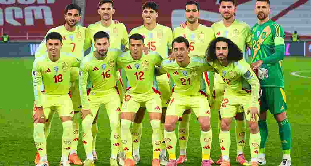 Members of the Spanish team line up for a group photograph. 