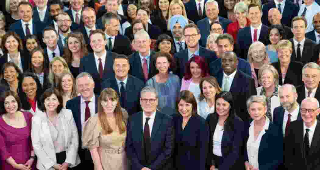 Keir Starmer, centre front, and Labour MPs gather in Westminster, UK.