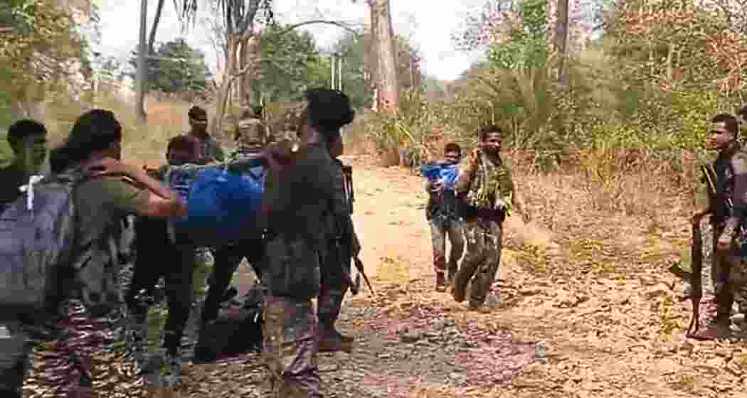 Security personnel transport the bodies of Naxals on Saturday after a deadly encounter in Sukma, Chhattisgarh, where 16 insurgents were neutralised. The joint CRPF-DRG operation is still in progress.