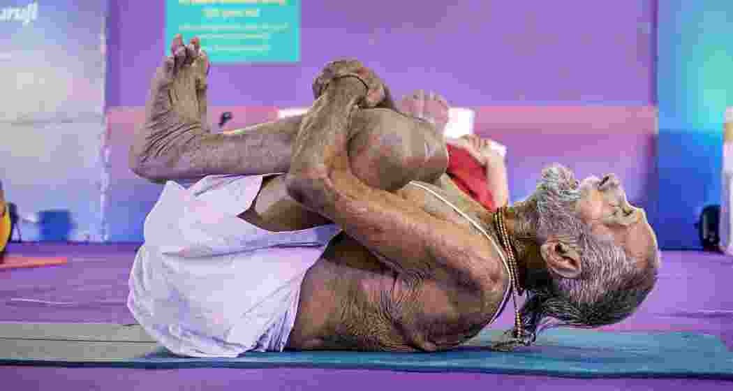 Padma Shri recipient and yoga practitioner Swami Sivananda performs an 'asana' during the Hitex SportsExpo, in Hyderabad. Swami Sivananda Baba has been attending every Kumbh Mela across Prayagraj, Nashik, Ujjain and Haridwar for the past 100 years, according to his disciple Sanjay Sarvajana. 