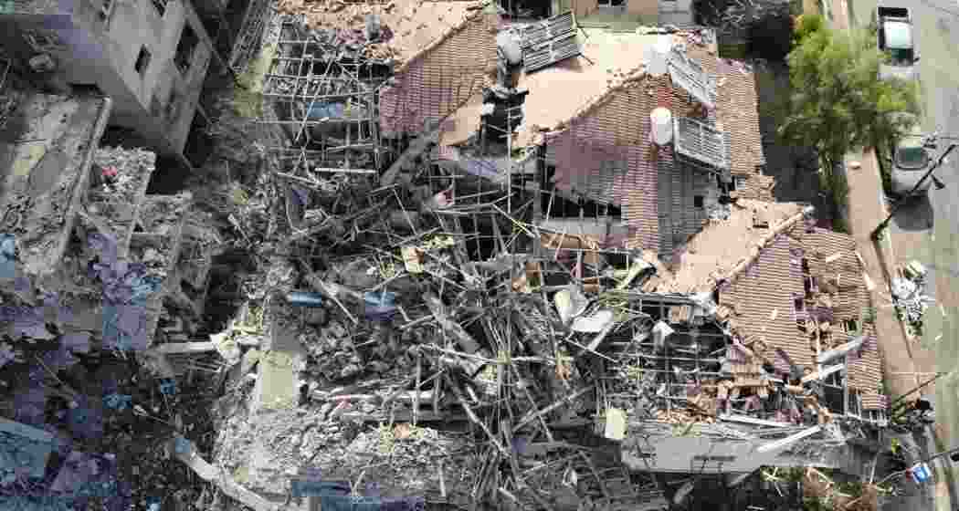 Destroyed residential buildings that were hit by a missile fired from Iran is seen in Ramat Gan, near Tel Aviv, Israel on Saturday.