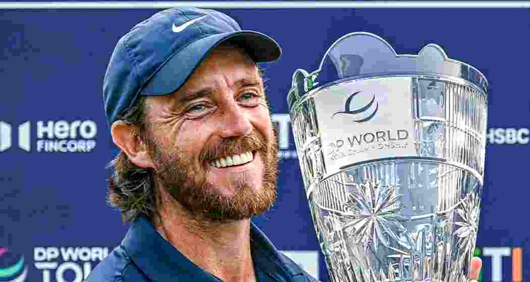 Tommy Fleetwood celebrates victory at the inaugural DP World India Championship at Delhi Golf Club.