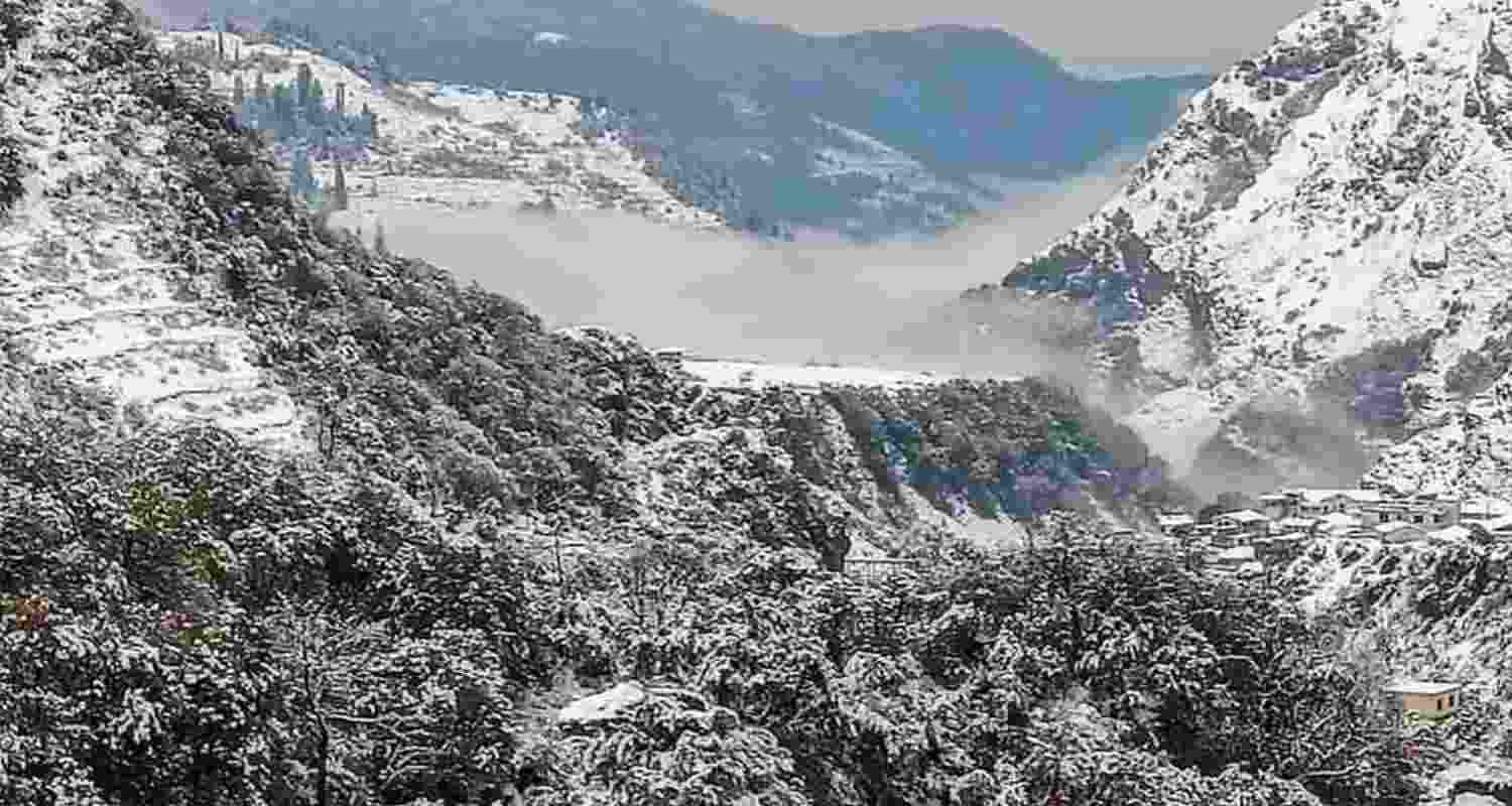 Heavy snowfall in Darjeeling and Sikkim disrupts life as Western Disturbance intensifies; tourist dies at Sandakphu, raising safety concerns in hills.