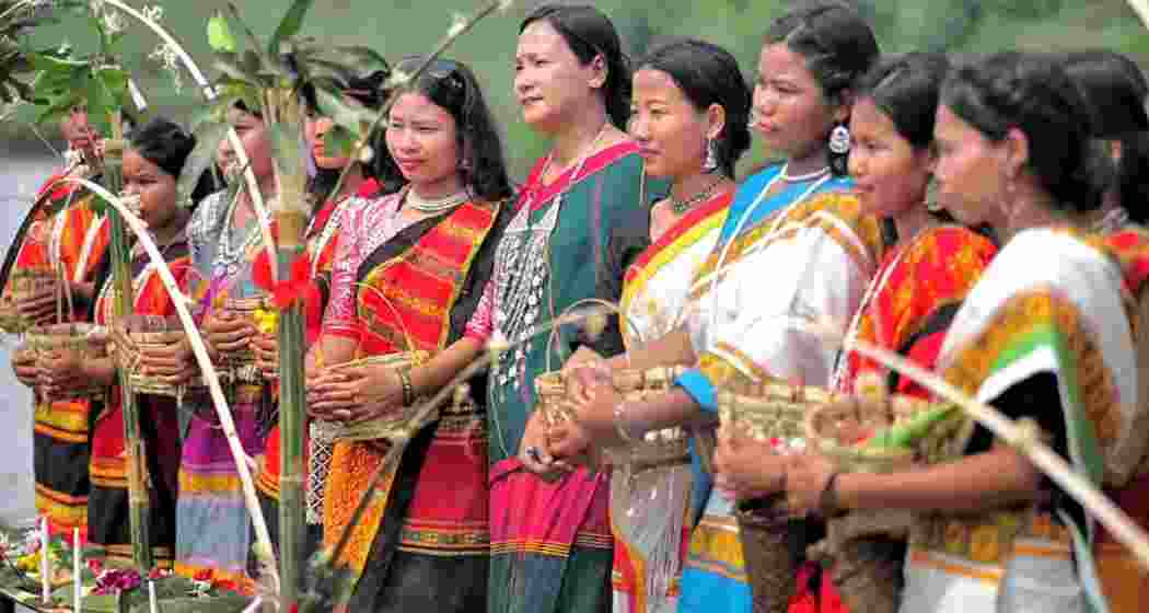 Devotees participate in Charak rituals during Chaitra Sankranti celebrations in Tripura, where fairs, folk performances and tribal festivities mark the end of the Bengali calendar year.